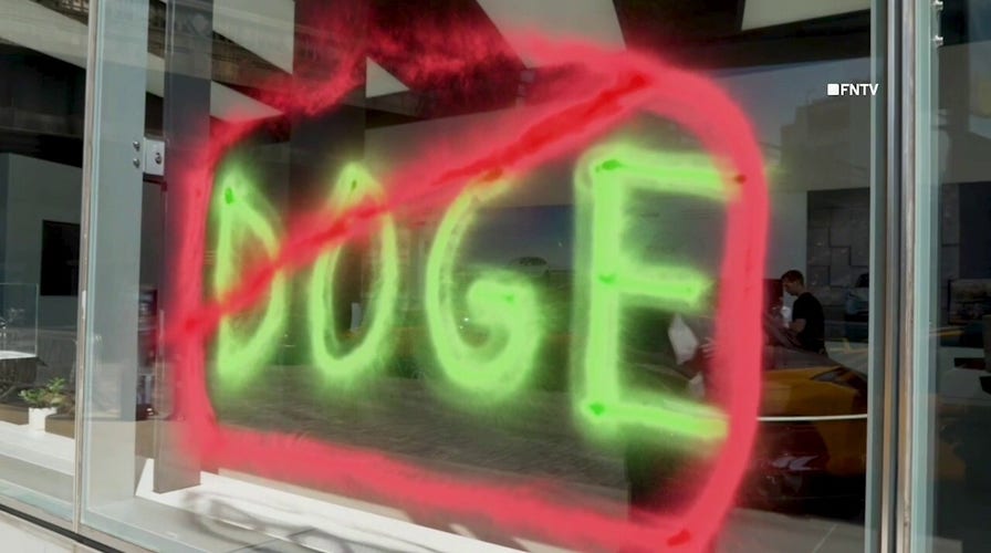 Climate vandals spray paint NYC Tesla dealership in Earth Day protest, clean it off when police arrive