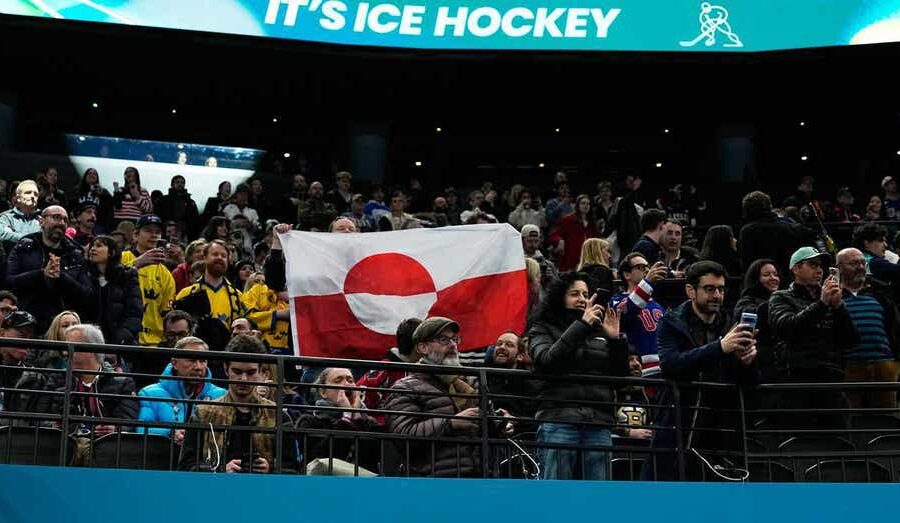 Olympic hockey fans raise Greenland’s flag during USA’s dominant win over Denmark, sparking viral reaction